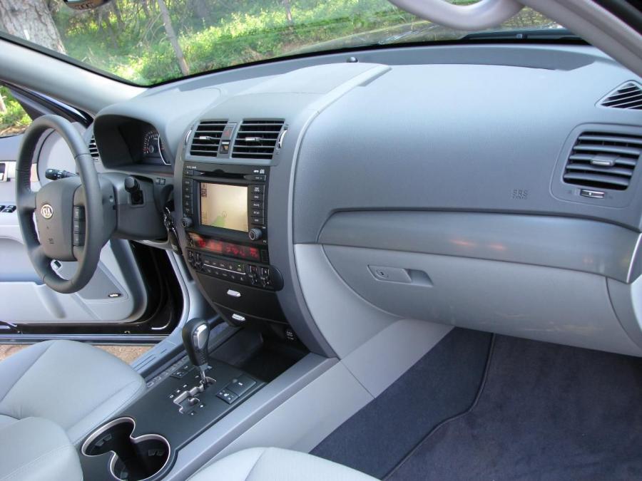  Kia Borrego 2009 года  (фото 28 из 345)